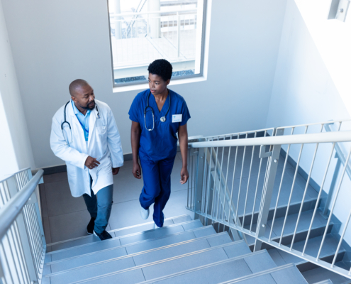 a doctor and nurse discussing a culture of safety in healthcare