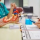 A group of people looking at a model of human organs
