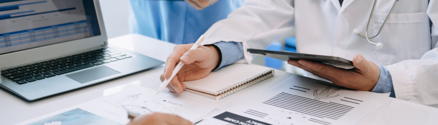 Medical team having a meeting with doctors in white lab coats
